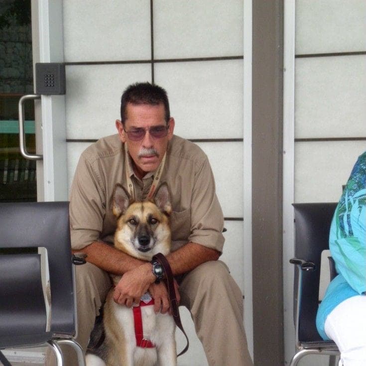 Ira Smith with Piper, his certified service dog